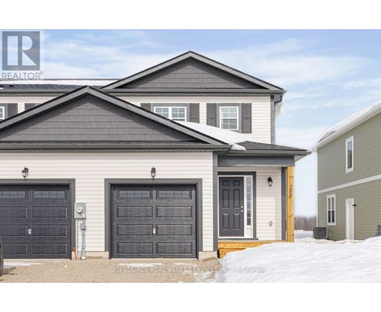 A house with a grey roof and a grey garage door.