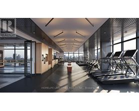 A gym with treadmills and a view of the city.