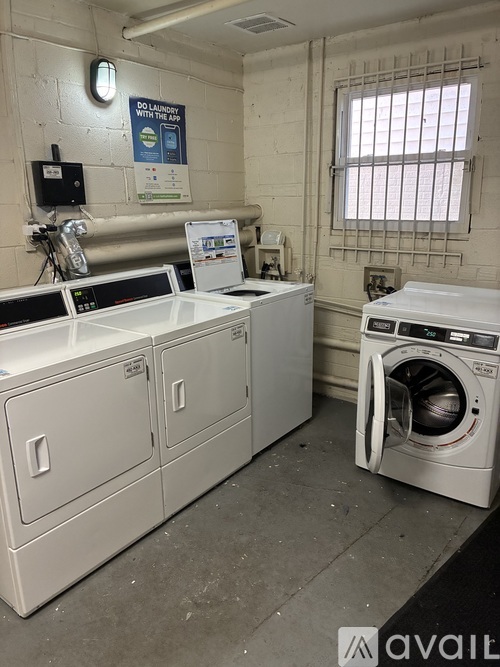 A laundry room with a washer and dryer.