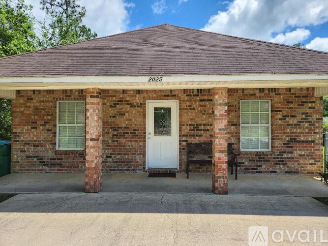 A house with the number 2025 on the roof.