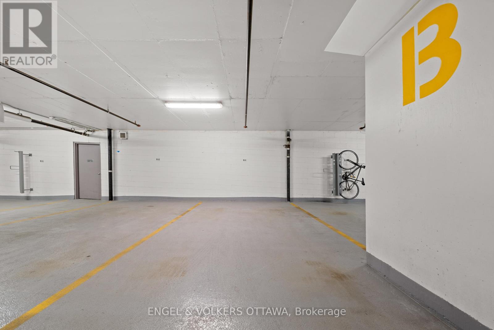 A brokerage office with a bicycle in the corner.