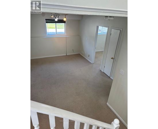 A room with a window and a door is on the market.