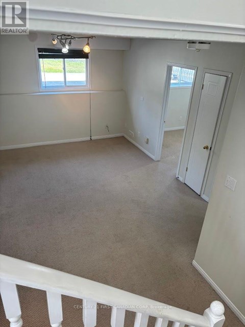 A room with a window and a door is on the market.