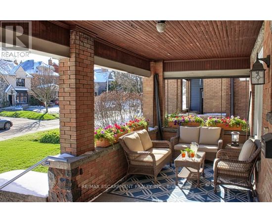 A patio with a table and chairs is shown.