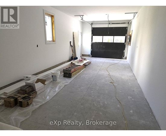 A room under construction with a lot of unfinished work.