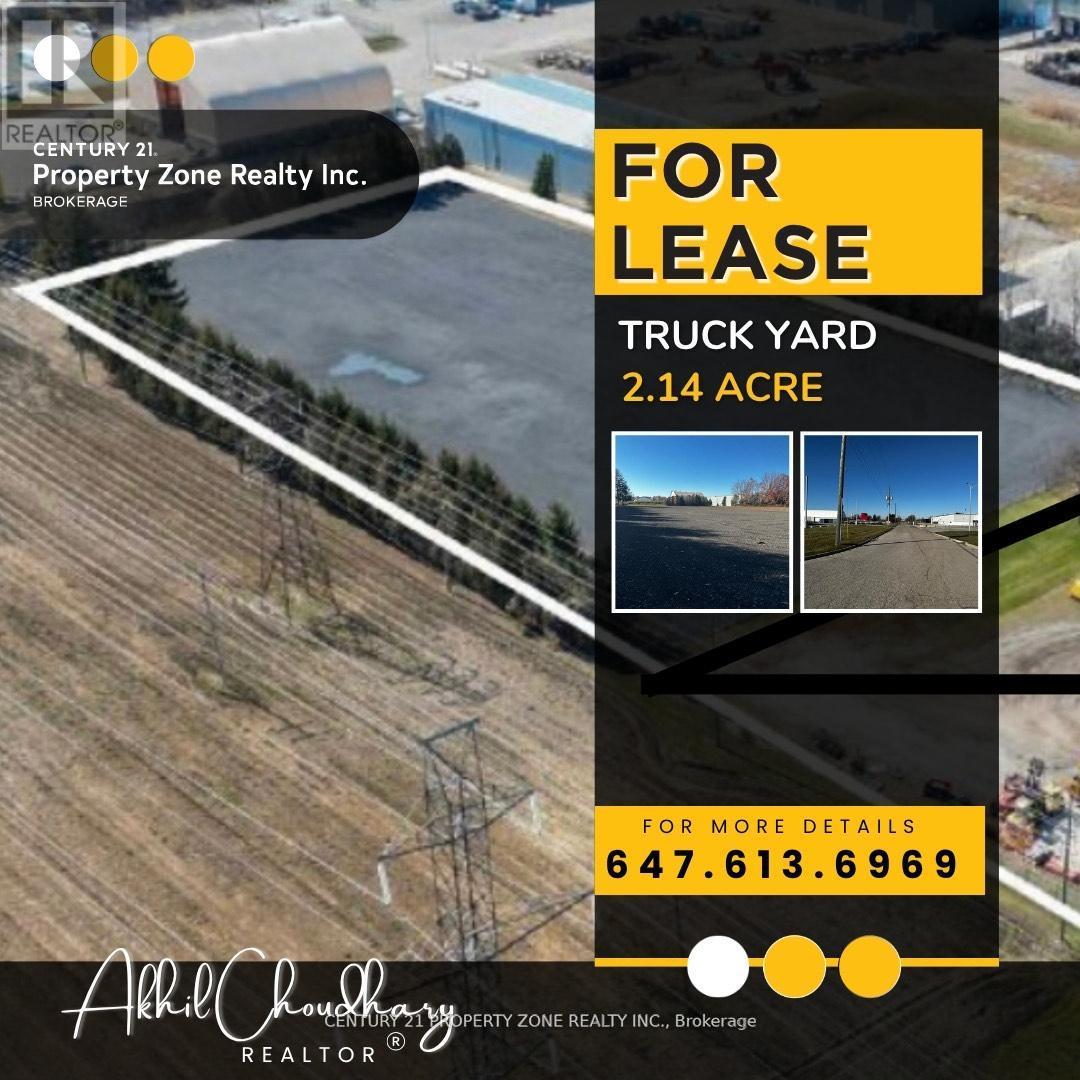 A real estate advertisement for a truck yard for lease.