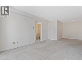 A room with a doorway leading to another room.
