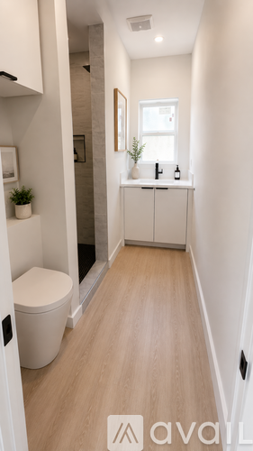 A small bathroom with a toilet and a sink.