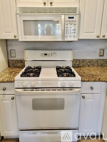 A white stove and oven in a kitchen.