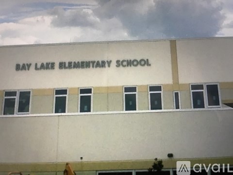 The front of a building with the words "Bay Lake Elementary School" on it.