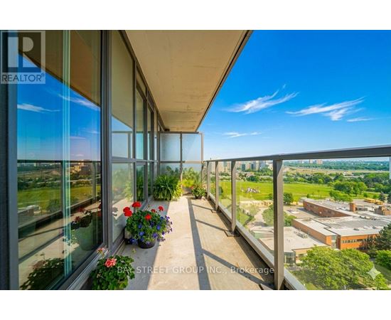 A balcony with a view of the cityscape and a bay street group inc brochure.