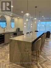 A realtor logo is on the top left corner of the image.