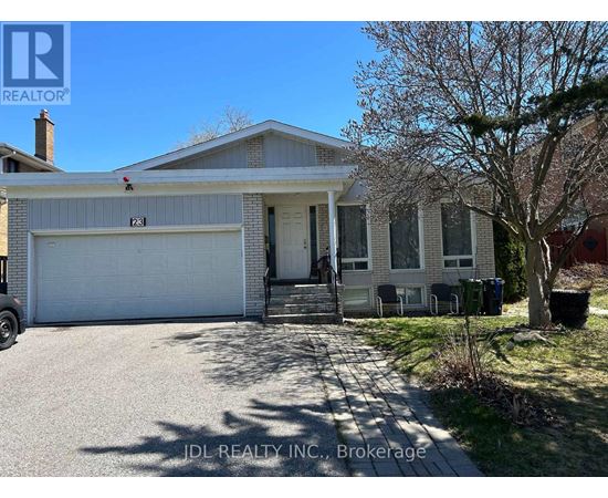 A house with a white garage door is for sale.