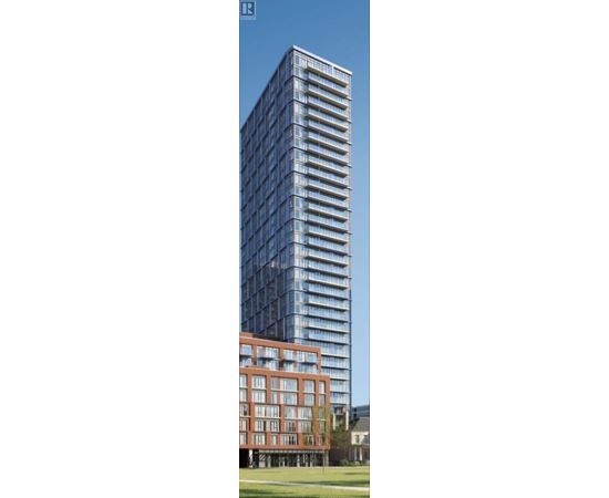 A tall building with many windows is shown in the image.