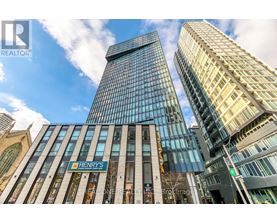 A tall building with a sign that says Henry's on it.