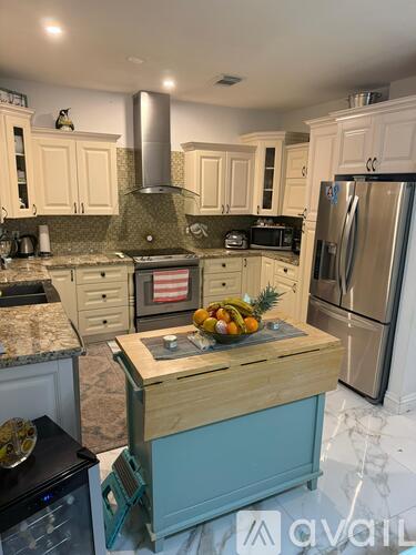 A kitchen with a blue stove top oven.