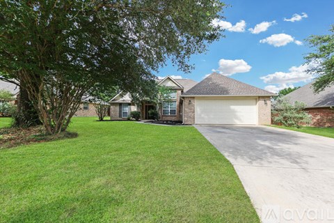 A house with a garage is available for sale.