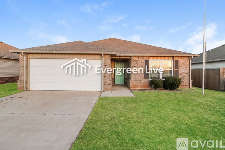 A house with a garage door that says Evergreen Live.