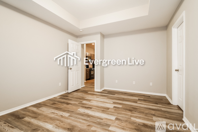 A room with Evergreen Live logo on the wall.
