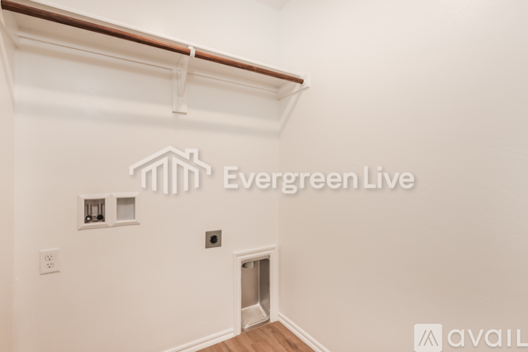 A room with Evergreen Live logo on the wall.