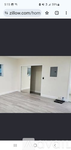 A room with a door and a window is shown.