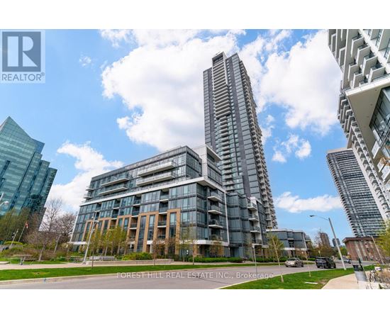 A modern building complex with the name "FORESHILL REAL ESTATE INC." on a sign in front.