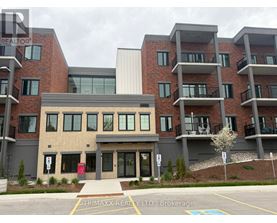 A building with the sign "Trimax Realty LTD, Brokerage" in front of it.