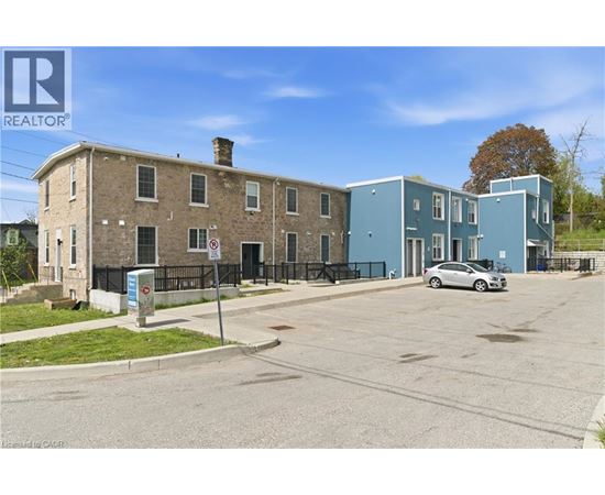 A realtor logo is on the top left corner of the image.