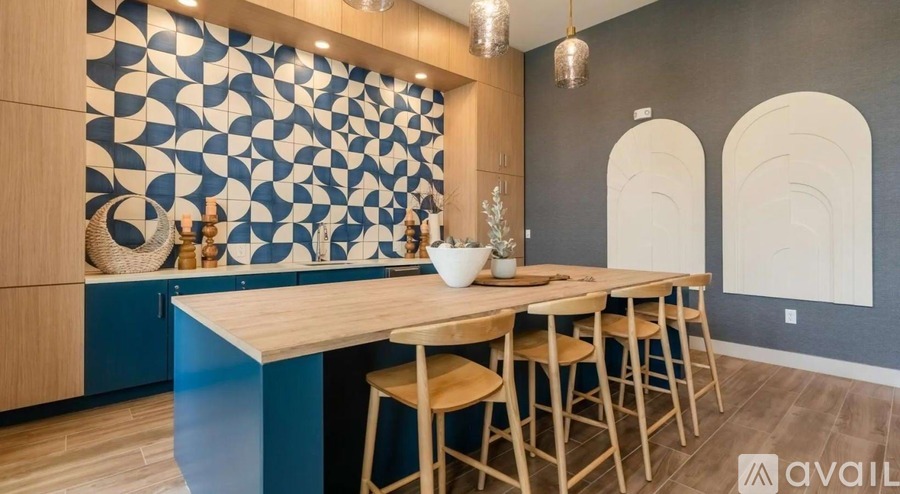 A dining area with a wooden table and chairs.