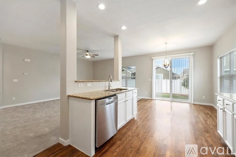 A kitchen with a dishwasher and a sink.