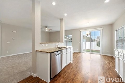 A kitchen with a dishwasher and a sink.