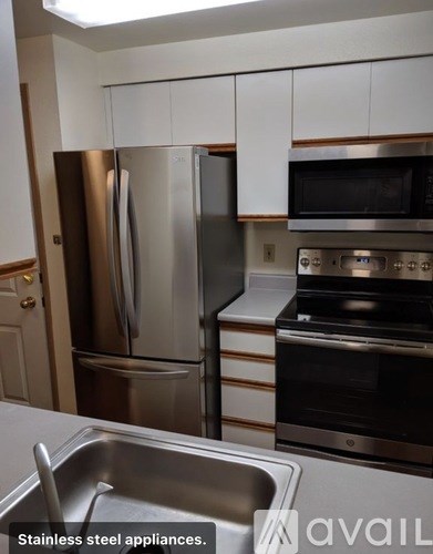 A kitchen with stainless steel appliances.