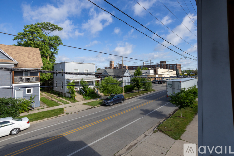 A street view with cars and buildings.