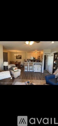 A living room with a couch and a coffee table.