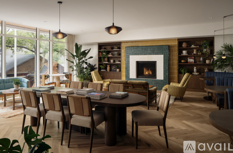 A modern living room with a fireplace and a dining table set up.
