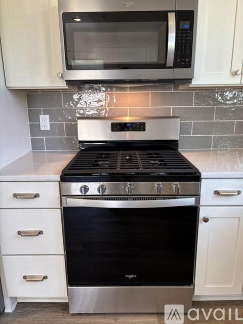 A modern kitchen with a stove and oven.