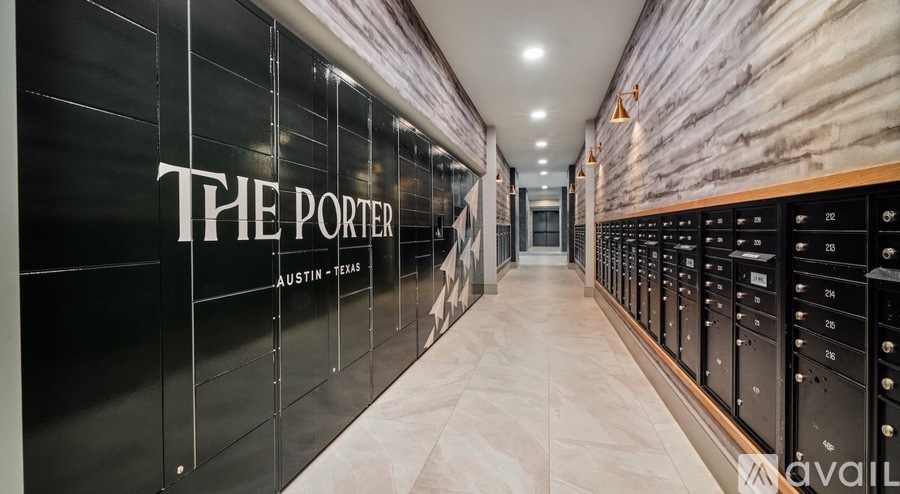 A hallway with a sign that says "The Porter Austin - Texas".