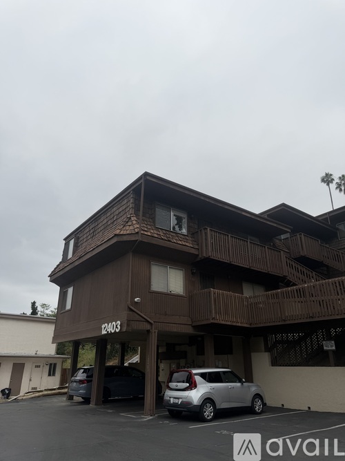 A brown building with the number 2403 on it.