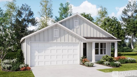 A two-car garage with a white door is surrounded by a well-manicured lawn and trees.
