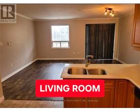 A living room with a sink in the middle of the room.
