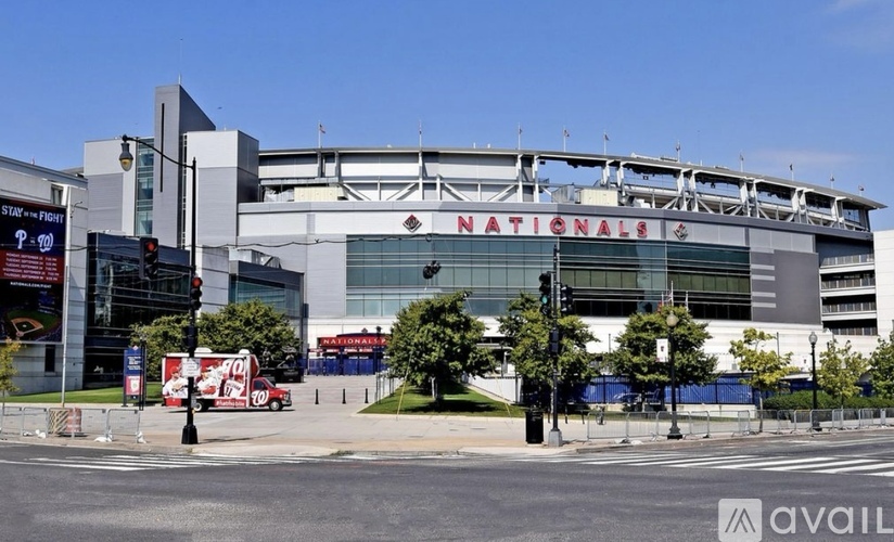 The exterior of the Nationals stadium is shown on a clear day.