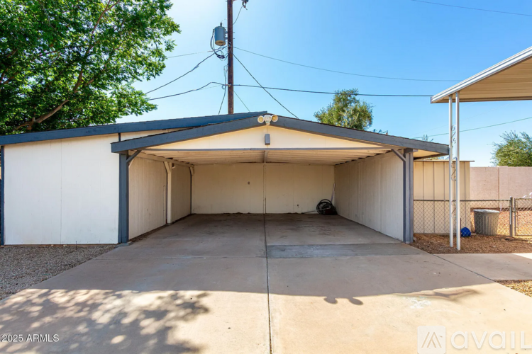 A garage with a white door and a brown roof is available for rent.