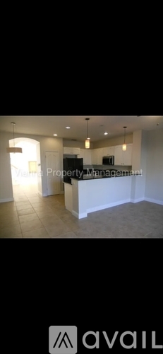 A spacious interior of a property with a reception desk.