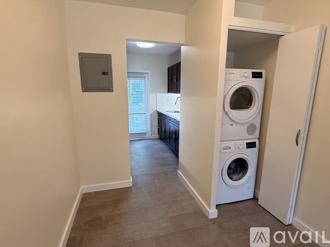A laundry room with a washer and dryer.