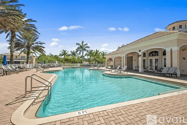 A large swimming pool with a 5 FT marking on the side.