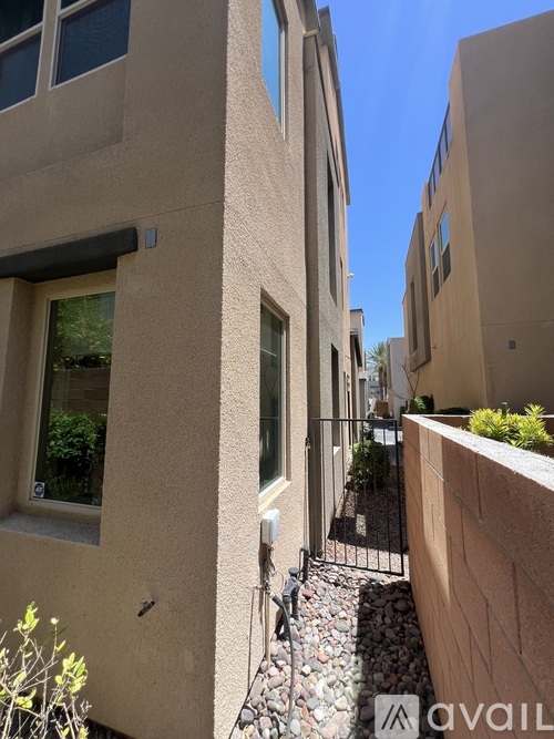A building with a window and a metal railing.