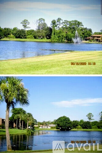 A serene landscape with a lake, trees, and a fountain.