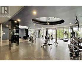 A gym with a variety of equipment is shown in the image.