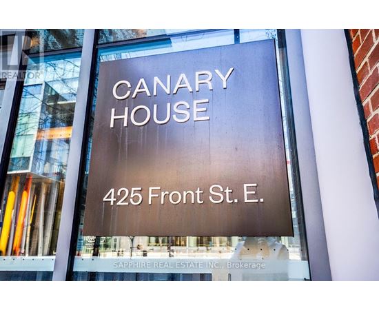 A sign for Canary House at 425 Front St. E.