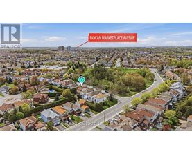 An aerial view of a residential area with a road labeled Roman Marketplace Avenue.